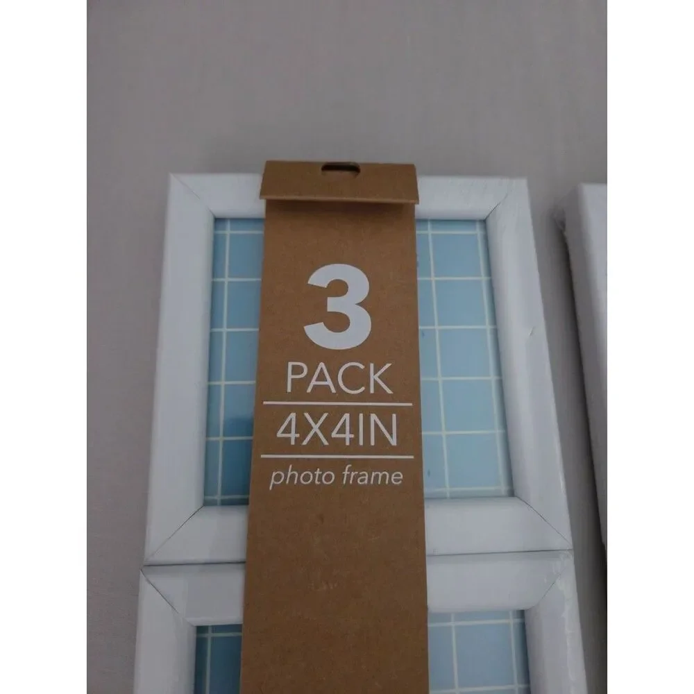 White 3-Pack 4x4in Photo Frames. 9 frames total. new in original pkging and box.